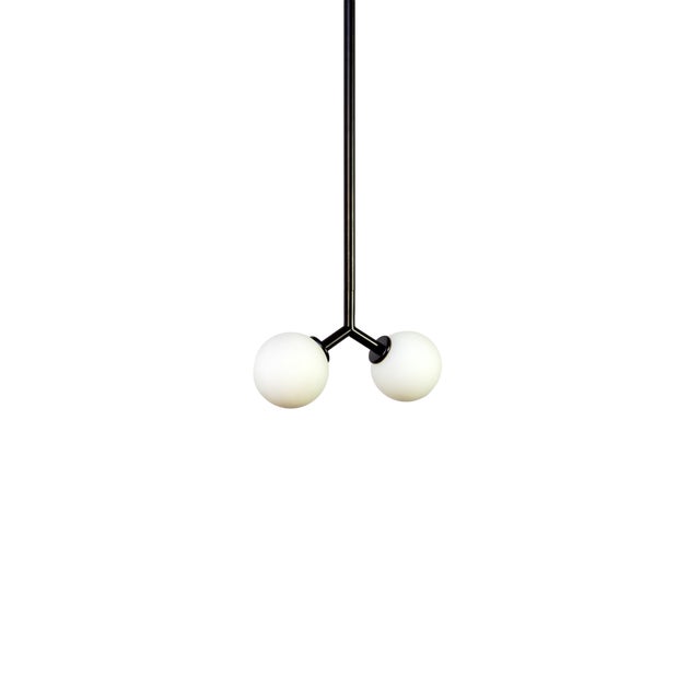 Cute and clean, the Y Mini Pendant Light isn’t trying to do too much; it’s doing just the right amount. Suspended by a...
