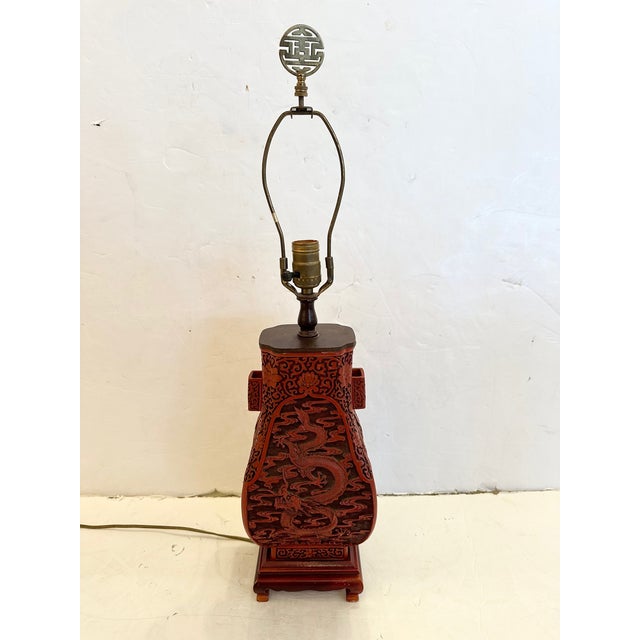 Chinese carved wood cinnabar table lamp 1950’s 27” H to finial x 6.5” W x 5.75” D Shade 10” H x 13” Diameter