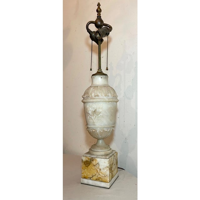 Add a touch of elegance to your living space with this large antique hand-carved alabaster stone and marble electric table...