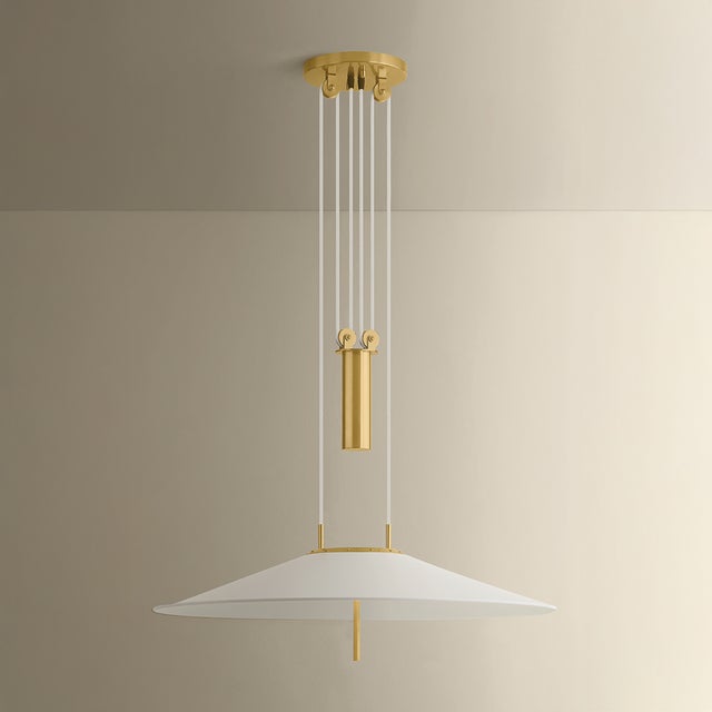 Celebrating its mechanical hardware, Emmons is a design-forward update on a rise-and-fall pendant. Exposed pulleys and...