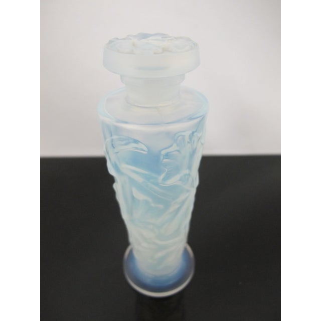 Marius-Ernest Sabino (French, 1878–1961) art glass perfume bottle "Orchidee". Opalescent glass bottle in tones of blue...