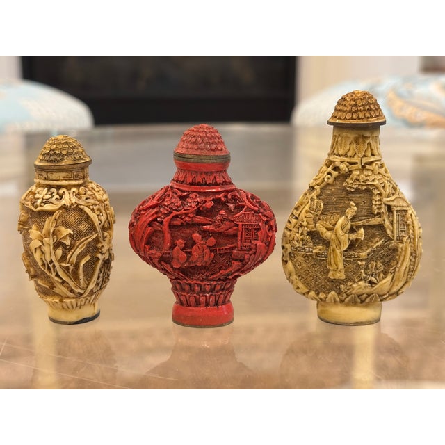 Collection of vintage intricately detailed Chinese style snuff bottles CIRCA: Mid-20th Century MAKER'S MARK: on bottoms...