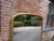 Large Antique English Arched Gilt Overmantle Mirror, 19th Century For Sale - Image 5 of 8