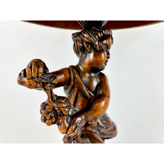 Antique Wooden Carved Cherub Bacchus Side Table, 1890s, in Very Good conditions. Designed before 1890