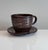 A high-quality studio ceramic art cup with saucer, created by the renown German ceramic artist Helma Klett (1908-1996)...