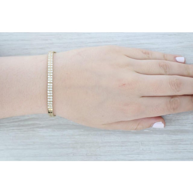 Gemstone Information: - Natural Diamonds - Total Carats - 2ctw Cut - Round Brilliant Color - F - G Clarity - VS1 - VS2...