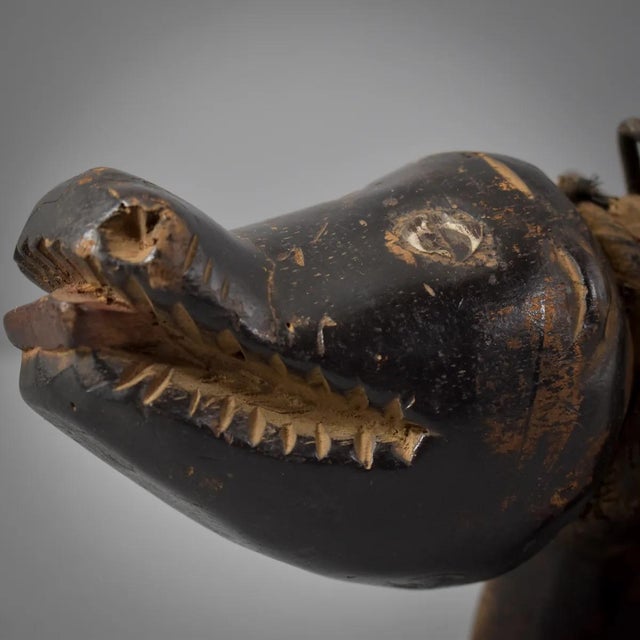Bakongo Nkisi Nikondi Nail Power Fetish Dog Congo is a striking, handcrafted spiritual object used in rituals to invoke...