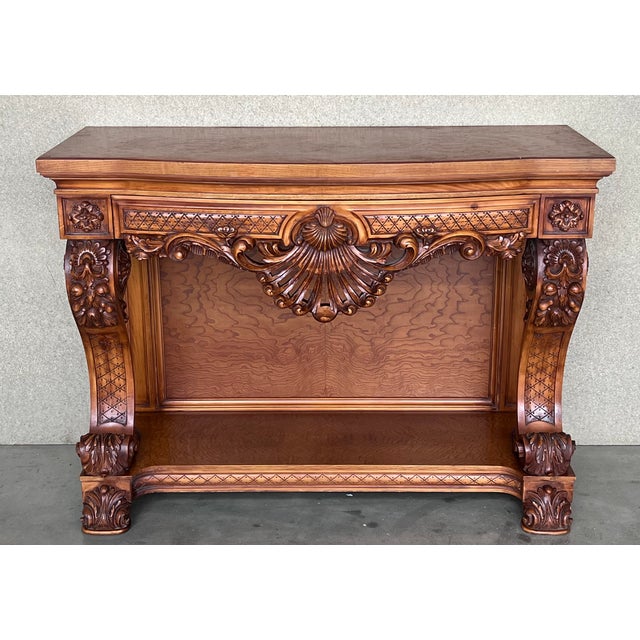 A Scandinavian mahogany early 19th century Empire table or console. This antique Swedish Biedermeier piece has a drawer...