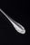 Georg Jensen, Denmark, c. 1915–1919 Large serving spoon in the "Lily of the Valley" pattern. Polished sterling silver with...