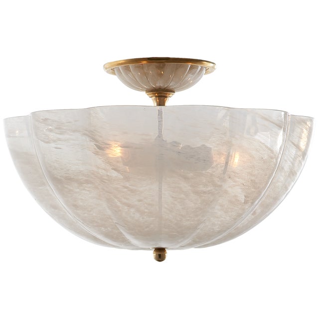 Rosehill Semi-Flush in Hand-Rubbed Antique Brass with White Strie Glass Designer: AERIN Canopy: 5.75" Round Mounting:...