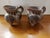 This is a Pair of Vintage Handmade Clay Art Animal/Ram Motif Handled Pitchers. Each measures 5" high, 5 1/2" wide to...