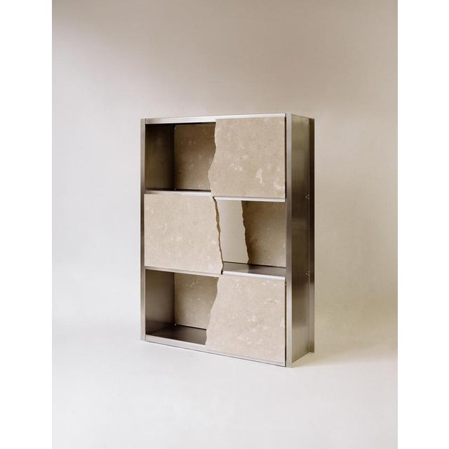 Unique aderiva cabinet in moleanos limestone & stainless steel by rosana sousa. One of a kind. Dimensions: d 38 x w 120 x...