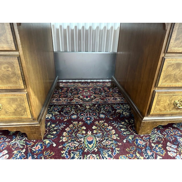 Enhance your office with the unmatched sophistication of our Baker Furniture Burled Walnut Veneer Desk. This beautifully...