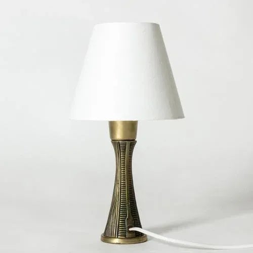 Lovely small table lamp by Sonja Katzin, made from brass with a cool embossed pattern on the base. This piece has an...