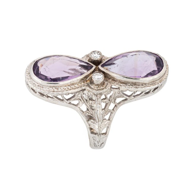 Finely detailed vintage Art Deco elongated amethyst & diamond ring (circa 1920s to 1930s) crafted in 14 karat white gold....