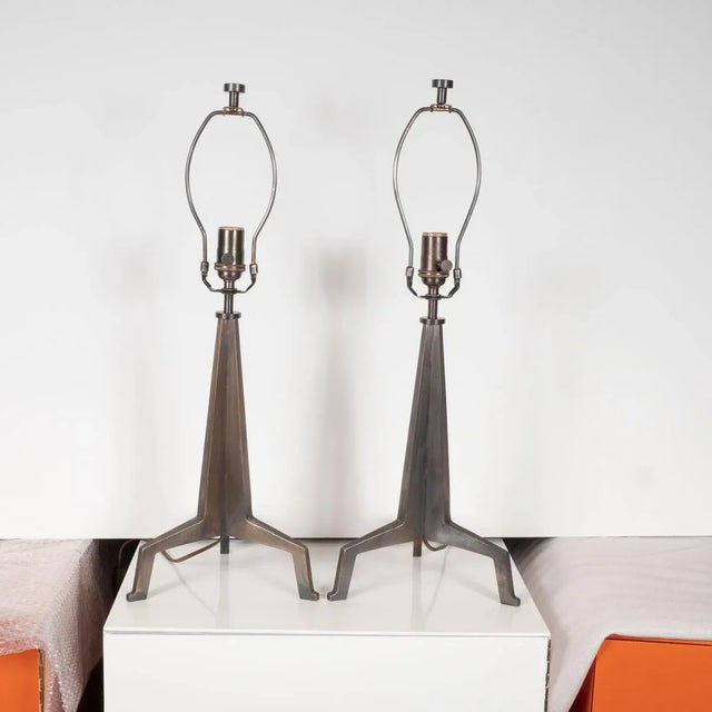 Pair of antiqued brass, brutalist style tripod lamps by Marcelo Bessa for Spark Interior in the style of Giacometti.