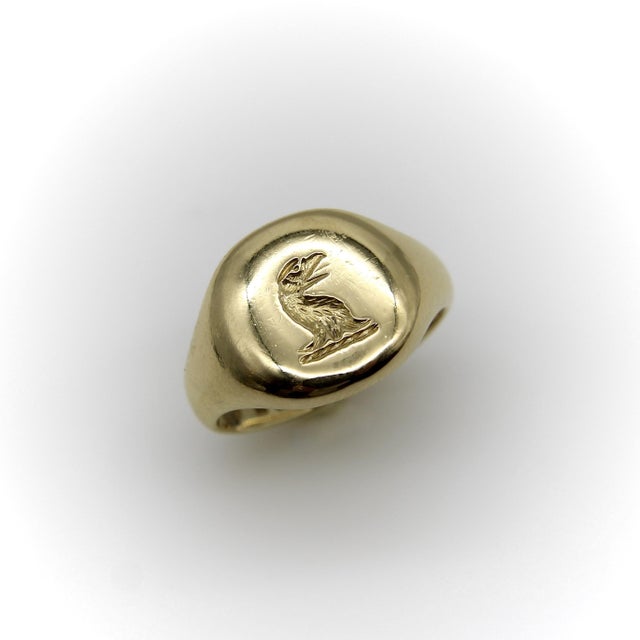 This 18k gold turn-of-the-century signet ring was made by Goldsmiths and Silversmiths Co. Ltd., a jeweler that was on...