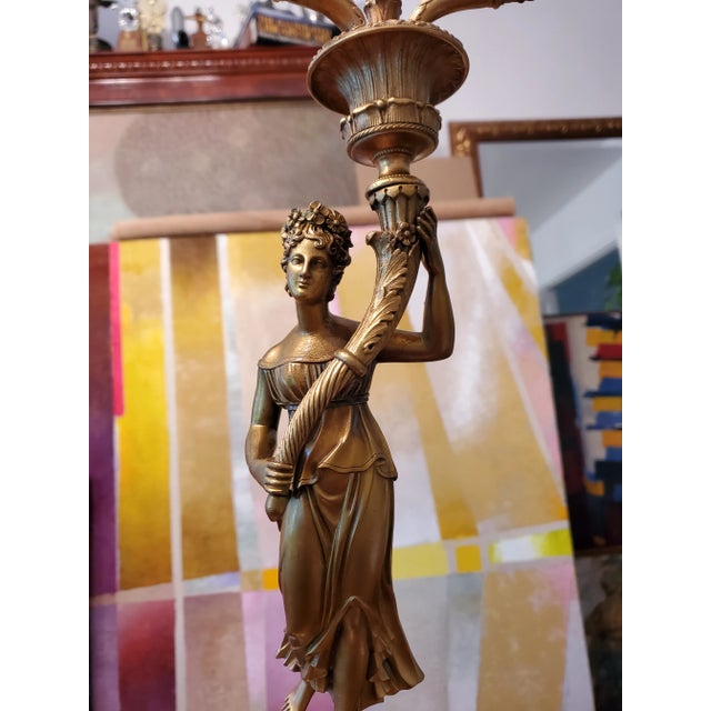 A magnificent pair of original French Empire gilt gold ormolu bronze female figure candleabras . Absolutely first quality...