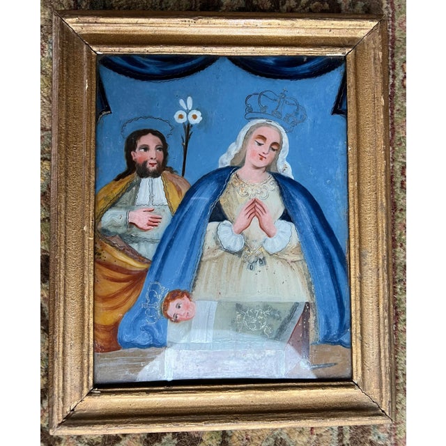 Reverse painted glass and framed. Scene of the Holy Family on Christams. Frame 12.5” x 10.25” Sight area: 10” x 7.75”