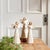 Bring a serene charm to your space with this set of Beige Floral Etched Angel Figurines. Crafted from durable polyresin...