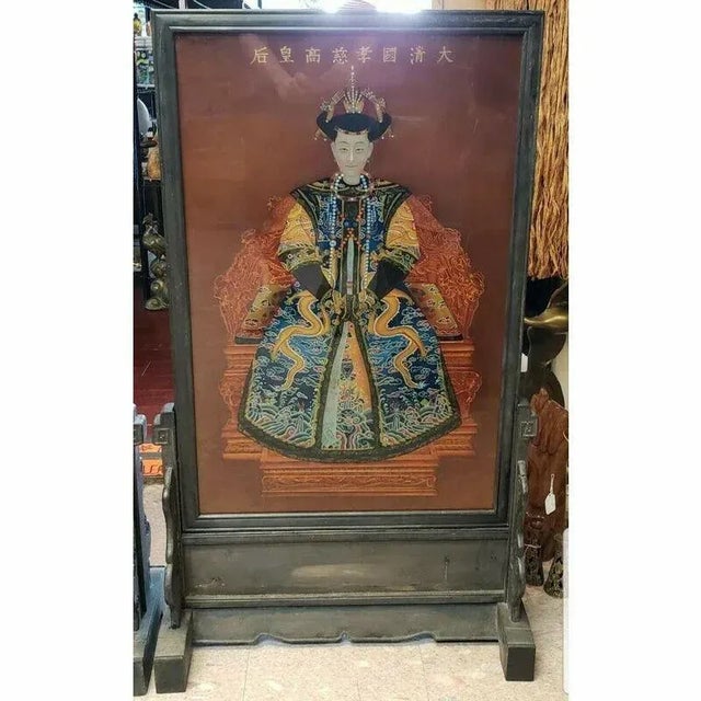 This is a Pair of Mid 20th Century Chinese Guangxu Emperor and Empress Dowager Longyu Reverse Painted Table Screens. Each...