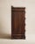 A charming chest of drawers with classic Colonial Revival styling and a warm, richly toned wood finish. Featuring four...