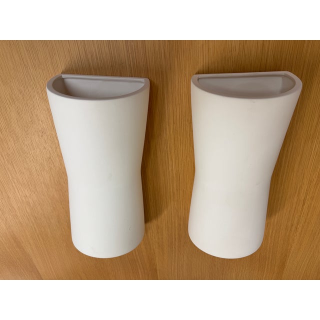 Design Plus Gallery presents a Pair of Mezzo Wall Sconces from Room & Board. The sconces are crafted of kiln-fired ceramic...