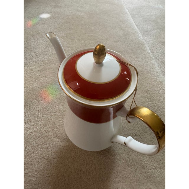 Mikasa bone China coffee/tea pot set including a creamer and a sugar container in Mikasa Egyptian Terracotta pattern....