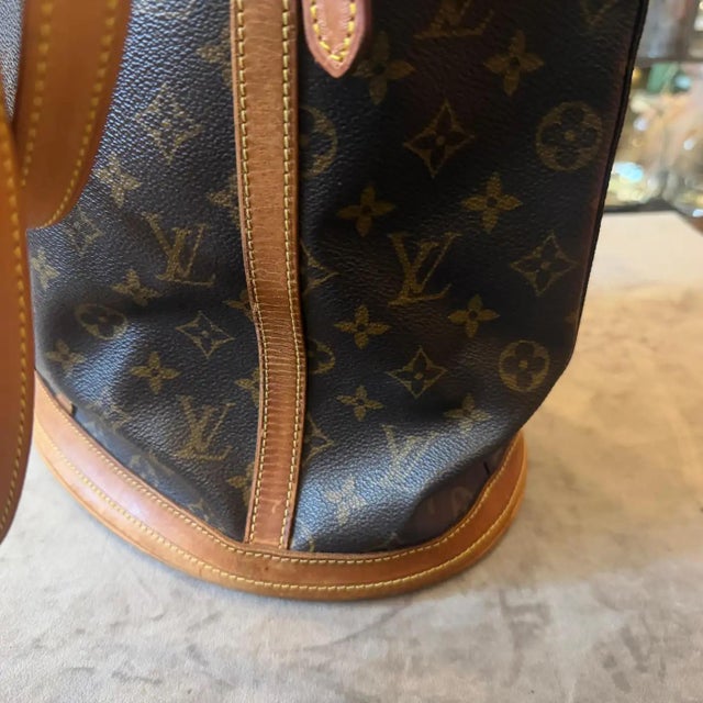 A 2006 Louis Vuitton Monogram Coated Canvas and Leather Bucket Gm Tote Bag For Sale - Image 14 of 14