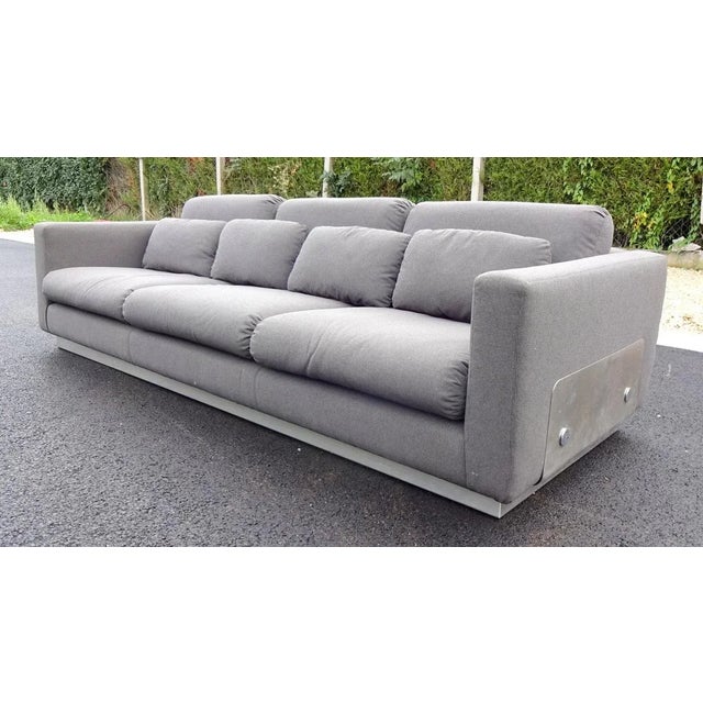 Large restored sofa ( foam , cushion , fabric ) with a brushed steel base in the manner of Michel Boyer