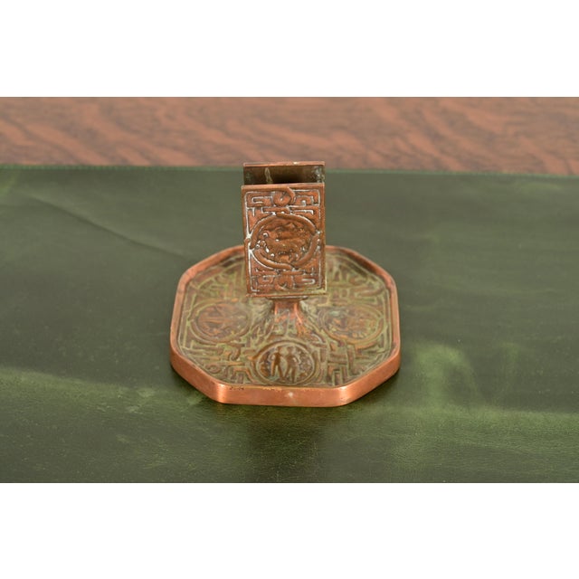 A gorgeous antique Arts & Crafts or Art Deco period bronze match box holder featuring symbols of the Zodiac By Tiffany...