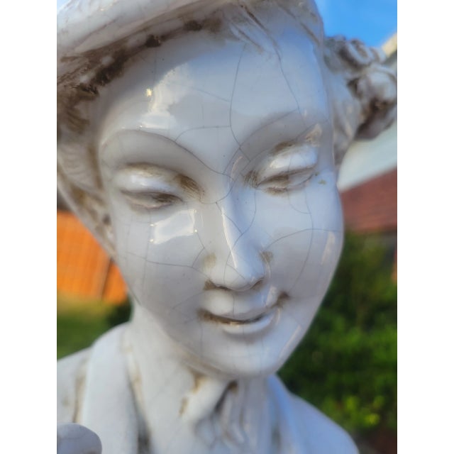 Celebrate timeless elegance with this evocative classical statue, a graceful embodiment of abundance and festivity. Cast...