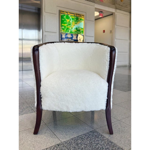 Subtly rounded lines and a curved back characterize the overall shape of these comfortable Danish Art Deco club chairs,...