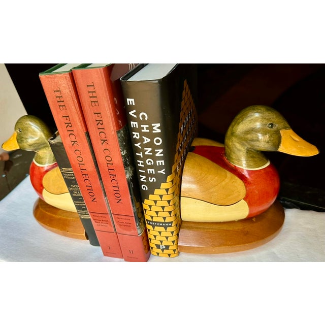 Vintage American Decoy Ducks as Bookends. These wooden, handcrafted painted and glazed sculptures of matching duck busts...