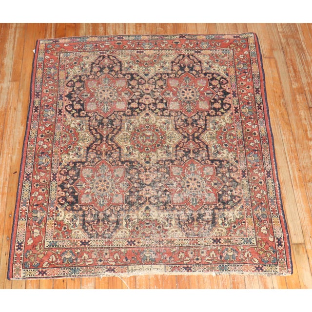 Late 19th Century Worn Persian Rug signed by weaver Measures: 4'1" x 4'8".