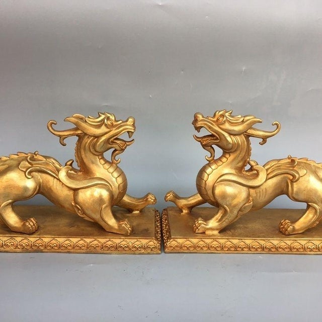 This striking pair of figures depicts Pixiu, mythical beasts traditionally associated with attracting wealth and warding...