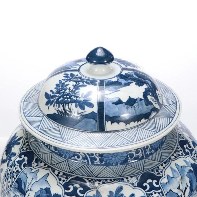 Large 20th century Guangxu Chinese export porcelain blue & white vase and cover. Of baluster form with panels of hand...
