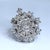 This is a large attention grabbing ring with a total of twenty six diamonds on display. - Stone Info - Round Diamonds 25x...
