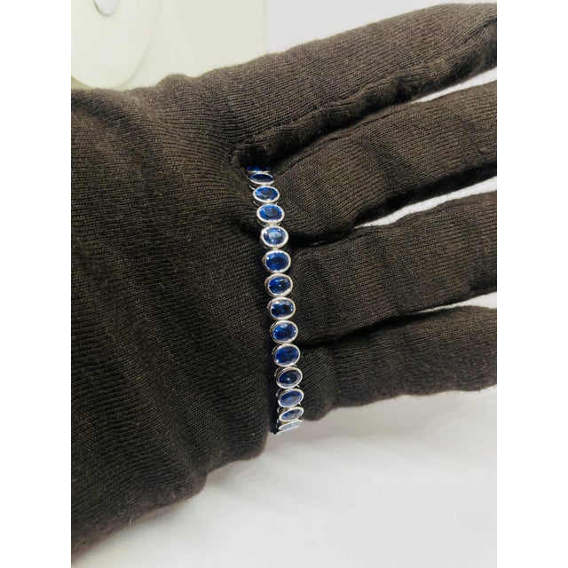 Gold Purity: 18K Solid Gold (stamped) SAPPHIRE: 17.38 CTS 18K GOLD GROSS WEIGHT: 12.68 GRAMS NET WEIGHT: 9.20 GRAMS CODE: BH