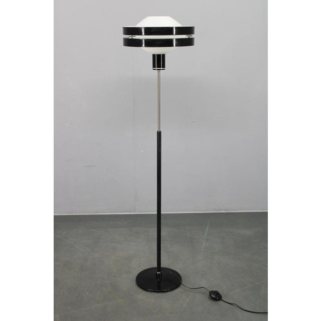 This original saturn floor lamp was designed by jaroslav bejvl and produced in czechoslovakia during the 1970s. The lamp...