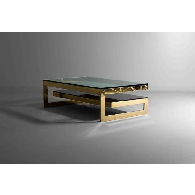 This piece is called the “G-table”, a quintessential piece of 1970s BelgoChrom. The table features a gleaming brass...