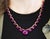 A 22K gold necklace with a 120-carat total assortment of pear-shaped pink checkerboard cut rubellite tourmalines. The gems...