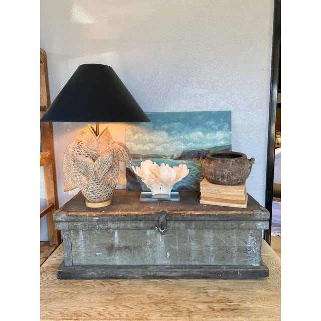 This utilitarian painted gray wood chest has a story to tell. The age and patina speaks for itself. The color is perfect....