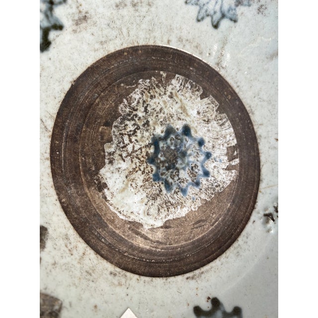 Blue, white and brown antique bowl made in china. Year made is unkown.