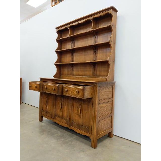 Authentic vintage sideboard / hutch / buffet / server. From the "Old Colonial" collection by Ercol. Maker's label inside...