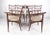 This stylish set of vintage modern dining chairs includes two armchairs and four side chairs. Sculpted high back seats,...