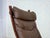 1970s, Norwegian design by Ingmar Relling. Lounge chair, model "Siesta". Original brown furniture leather, canvas, bent...