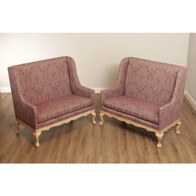 High Quality Pair of Paisley Patterned Custom Upholstered Love Seats, Having Blonde Wood Carved Base Featuring Scalloped...
