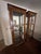 Add timeless elegance to your home with this stunning set of two Baker Furniture Collector's Edition curio display...