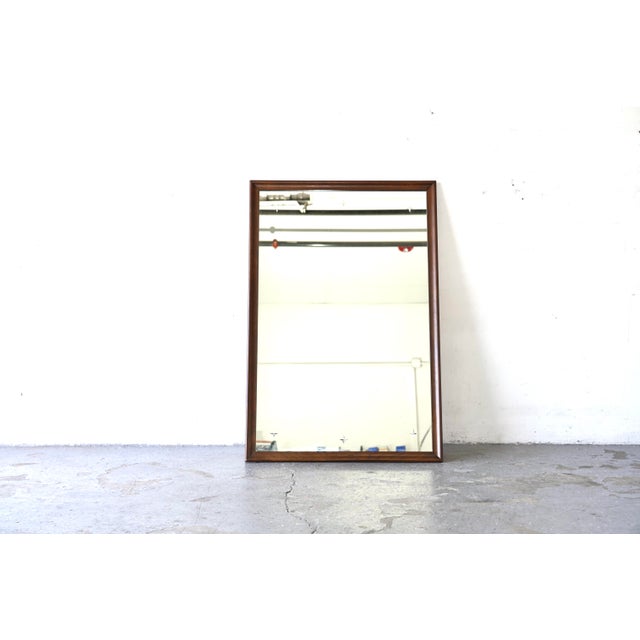 Beautiful vintage Broyhill Saga mirror featuring a warm walnut frame and six etched star details in the glass. This...